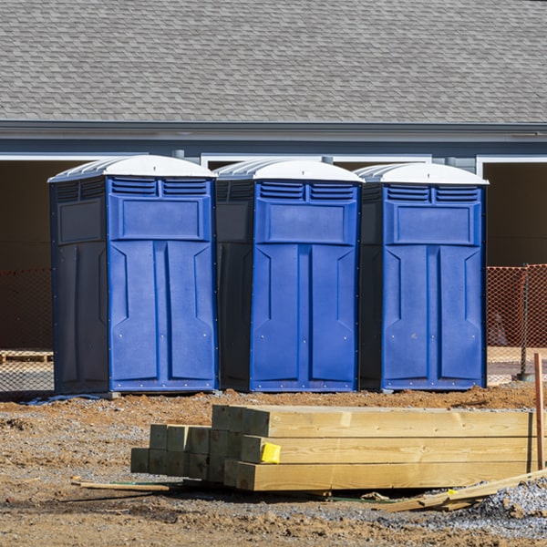 what is the cost difference between standard and deluxe portable restroom rentals in Sweet
